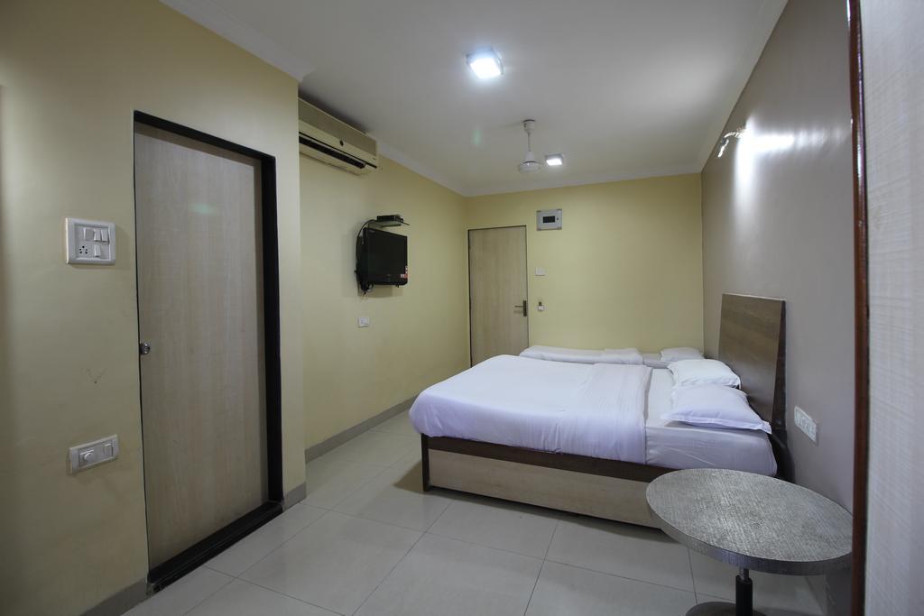 Hotel Samrat Мумбаї Номер фото
