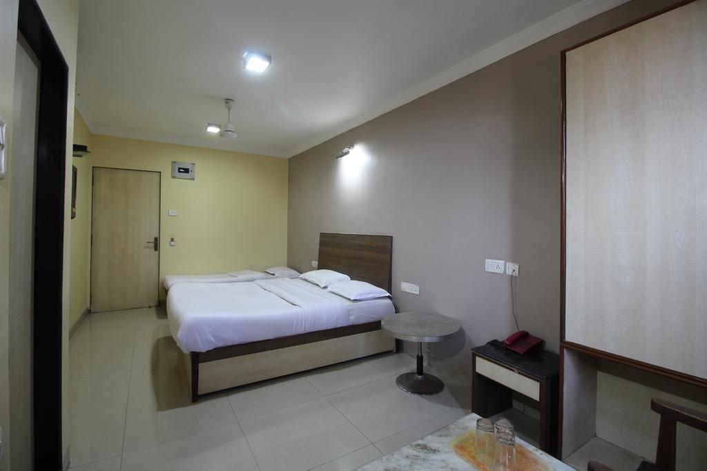Hotel Samrat Мумбаї Номер фото