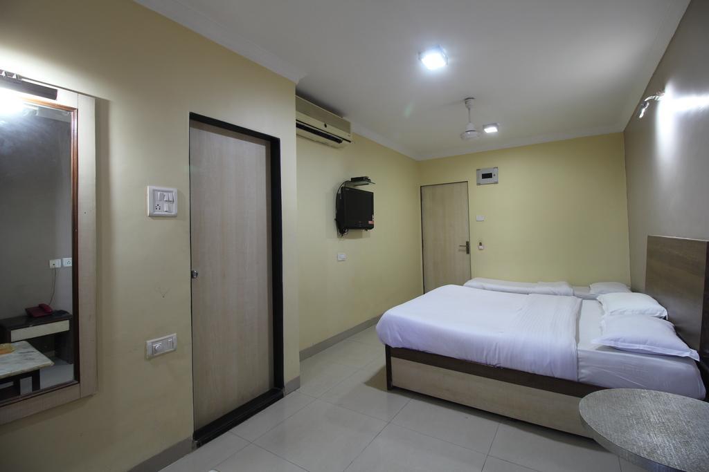 Hotel Samrat Мумбаї Номер фото