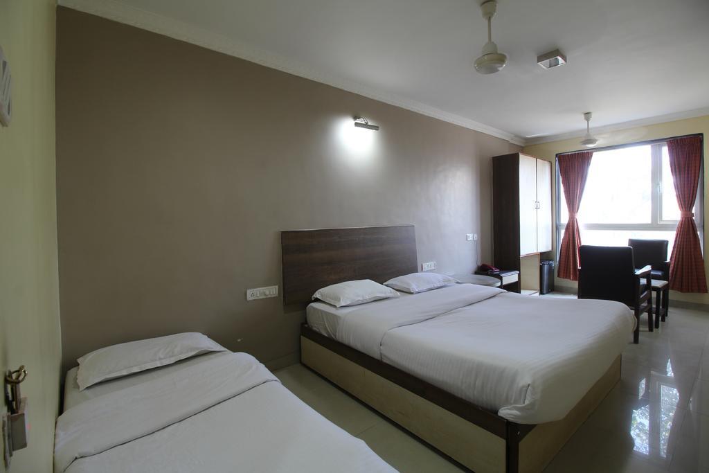 Hotel Samrat Мумбаї Номер фото